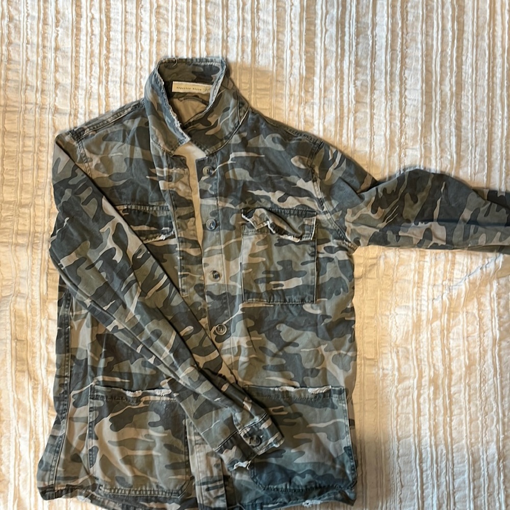 Distressed camo jacket from Lizard Thicker Boutique